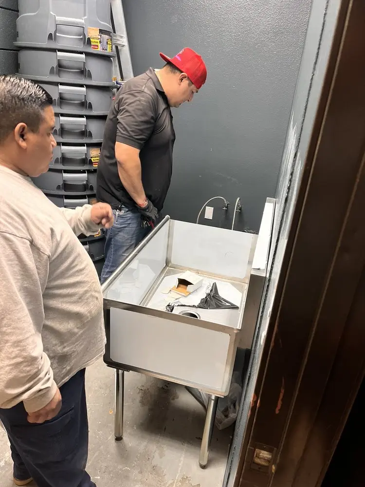 Commercial plumbing and sink installation in Wasco